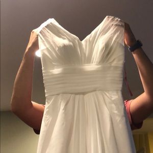 White gown perfect for graduation or prom
